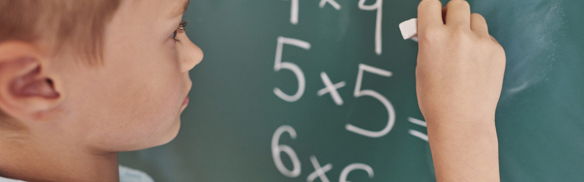 Boy doing some mathematical exercises Boy doing some mathematical exercises
